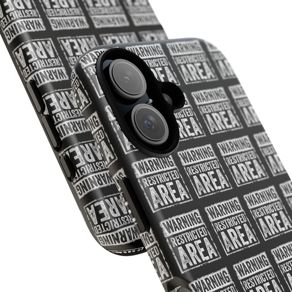 Angled black phone case with white warning 'RESTRICTED AREA' pattern and lens openings