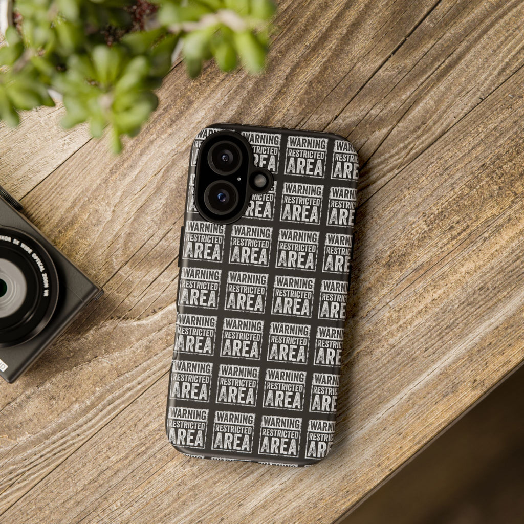 Black phone case with white warning text pattern and dual camera cutouts