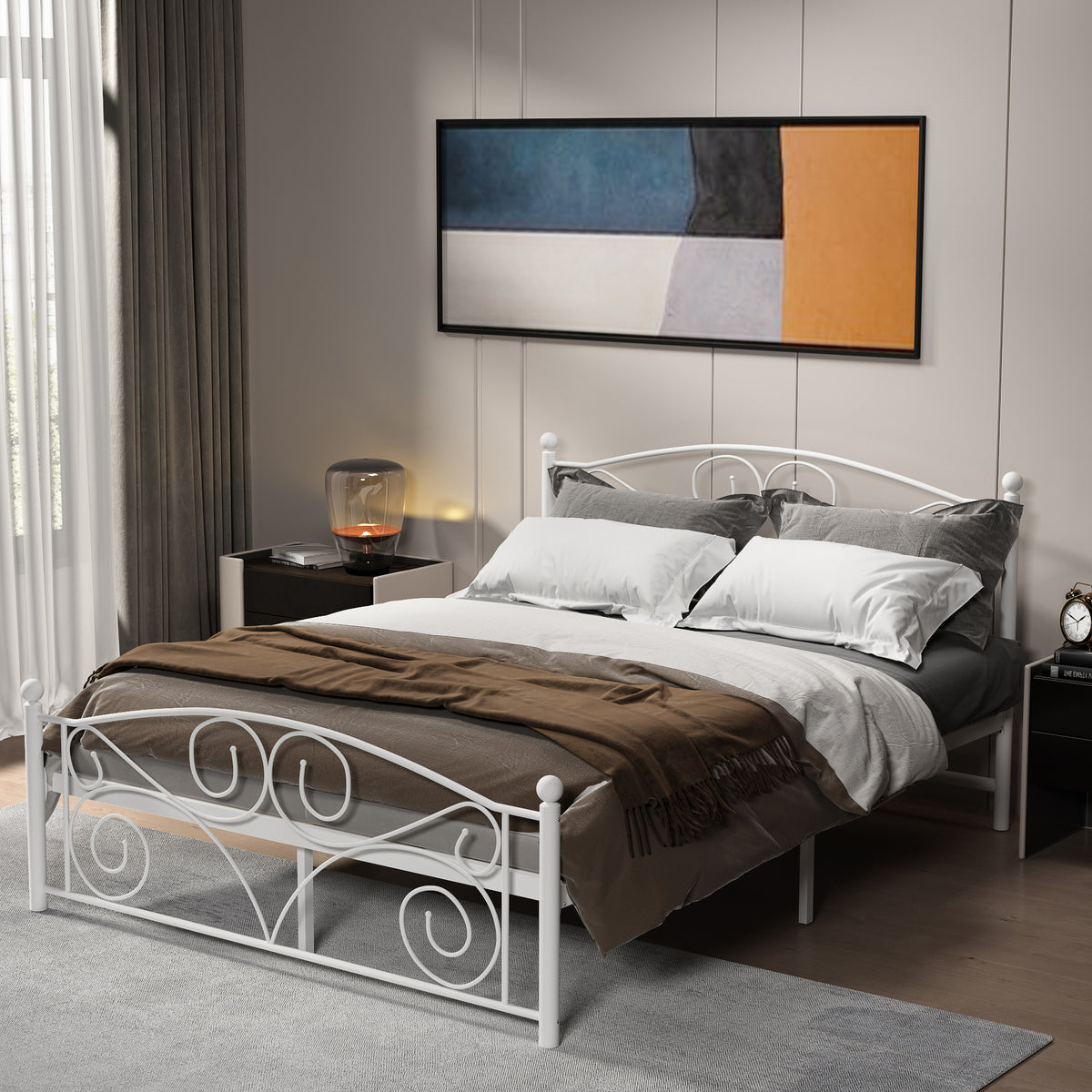 White metal bed frame with curved scrollwork headboard and footboard, slatted base