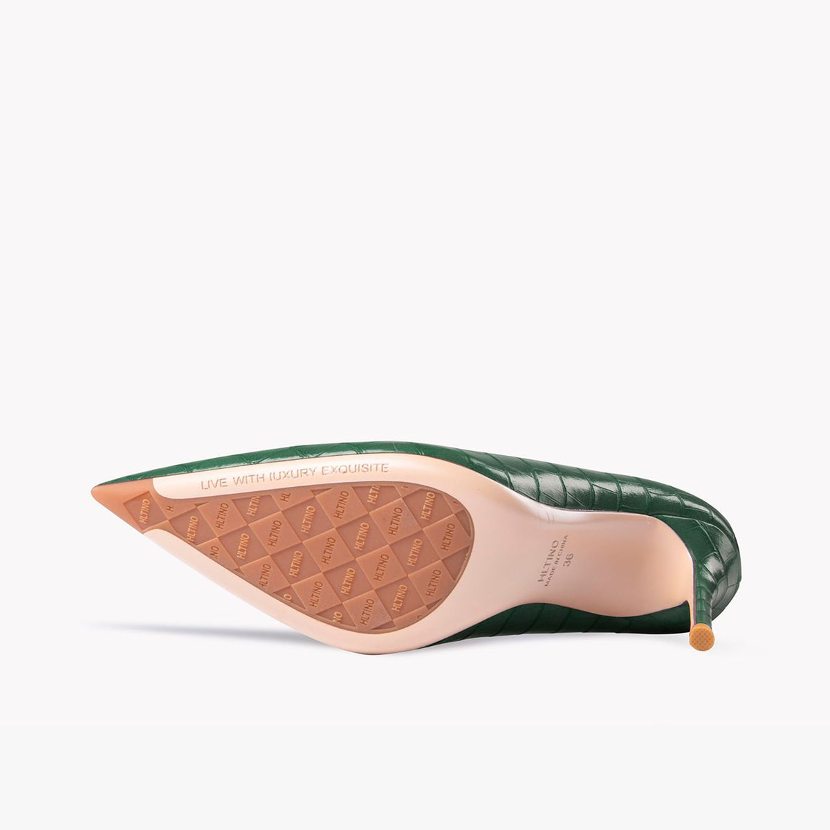Green patent leather pointed-toe stiletto pump, visible insole and outsole view
