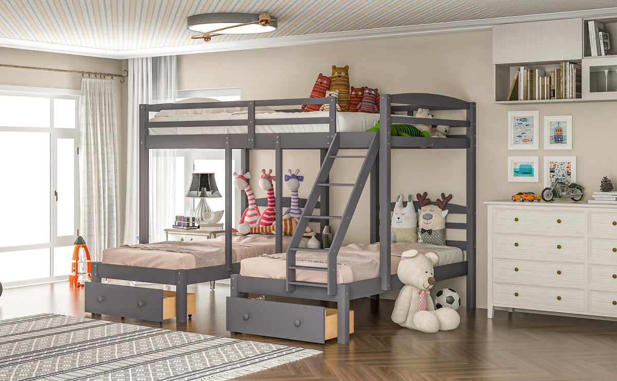 Gray triple bunk bed with drawers and ladder, styled with pillows and stuffed toys