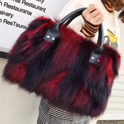 Burgundy and black faux fur handbag with black leather handles and silver snaps