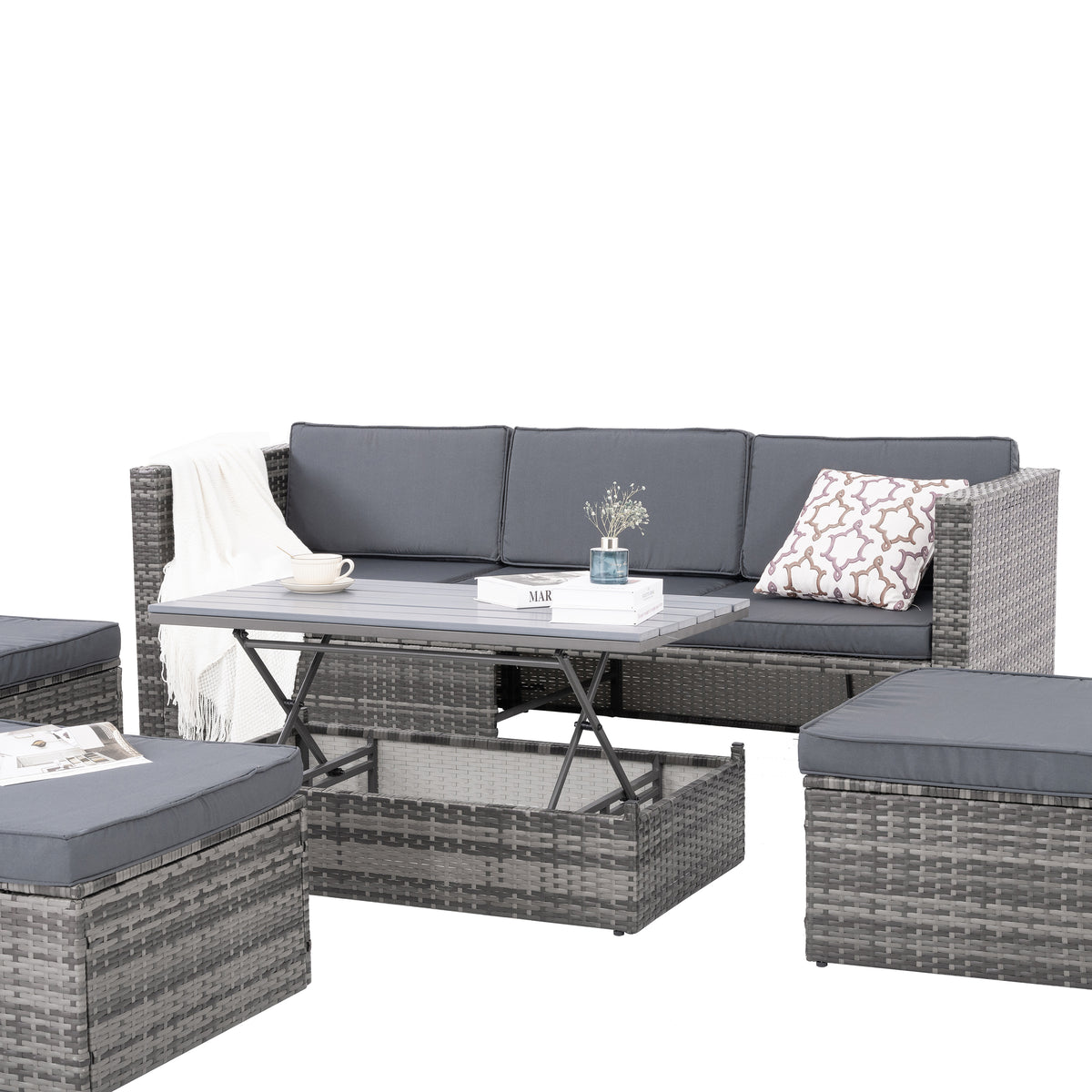Outdoor wicker patio seating set with dark gray cushions and glass-top coffee table