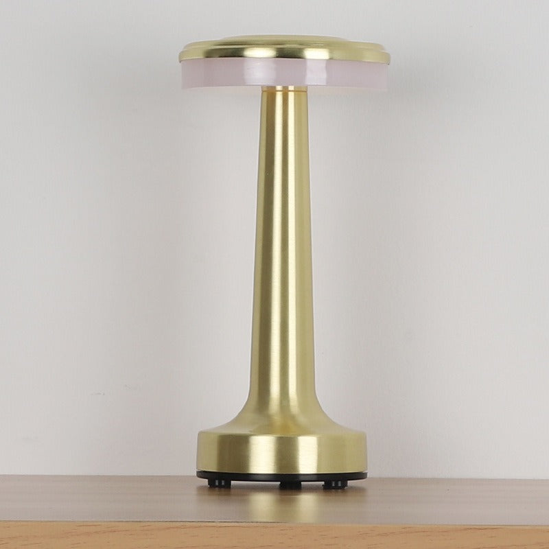 Gold retro table lamp with translucent top diffuser and drum fabric shade