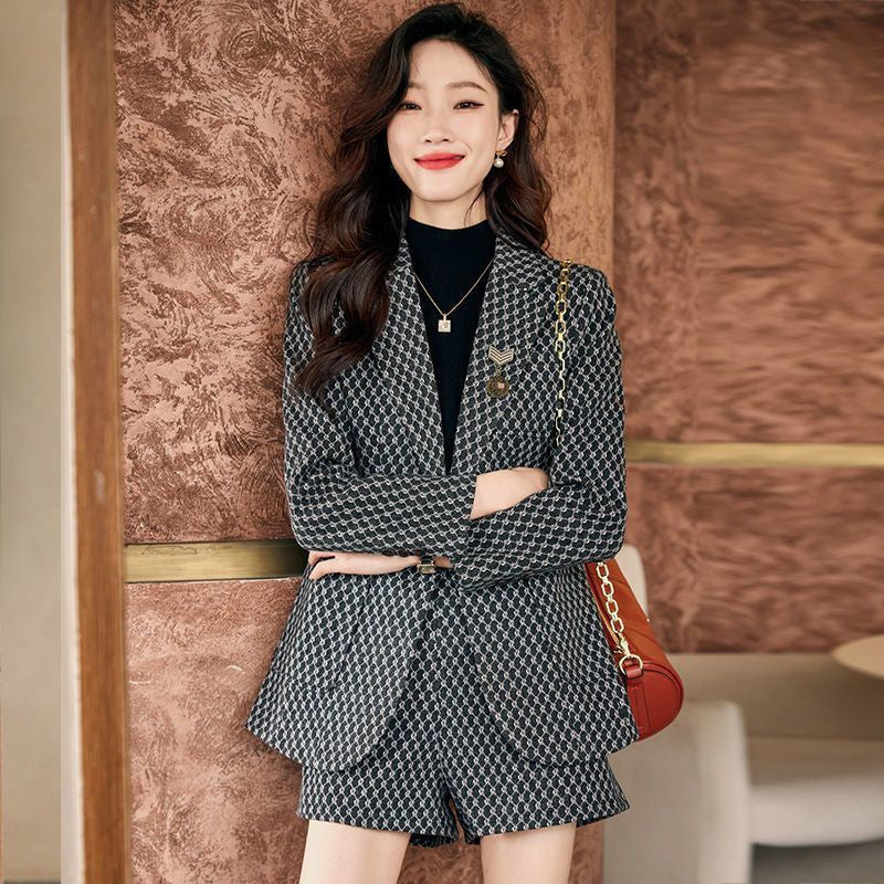 Women's tweed blazer and shorts set, dark check pattern, notched lapels and matching shorts