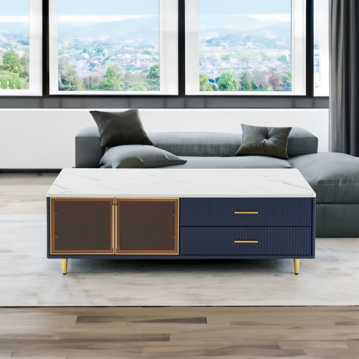 Modern navy coffee table with two cabinet doors, two drawers, and gold metal legs