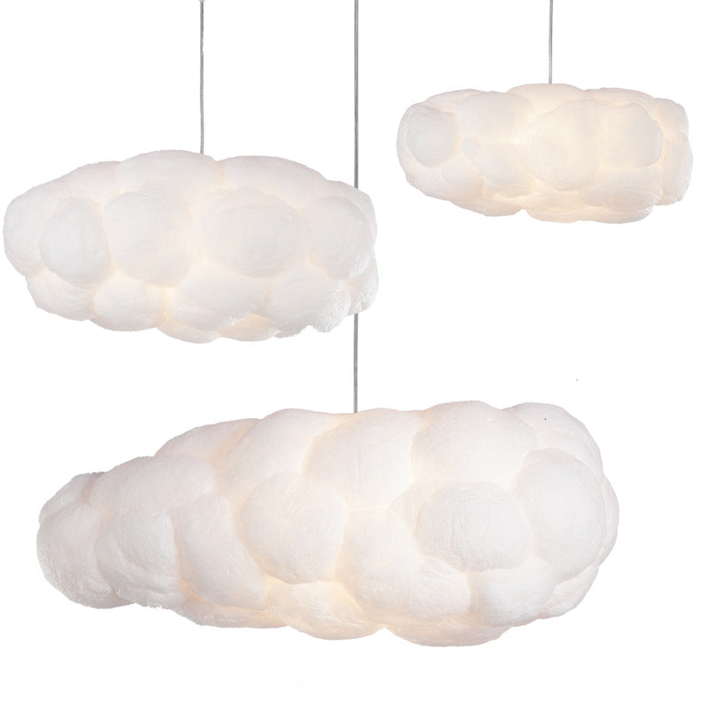 Three white cloud-shaped LED pendant lamps with fabric texture, suspended from cords