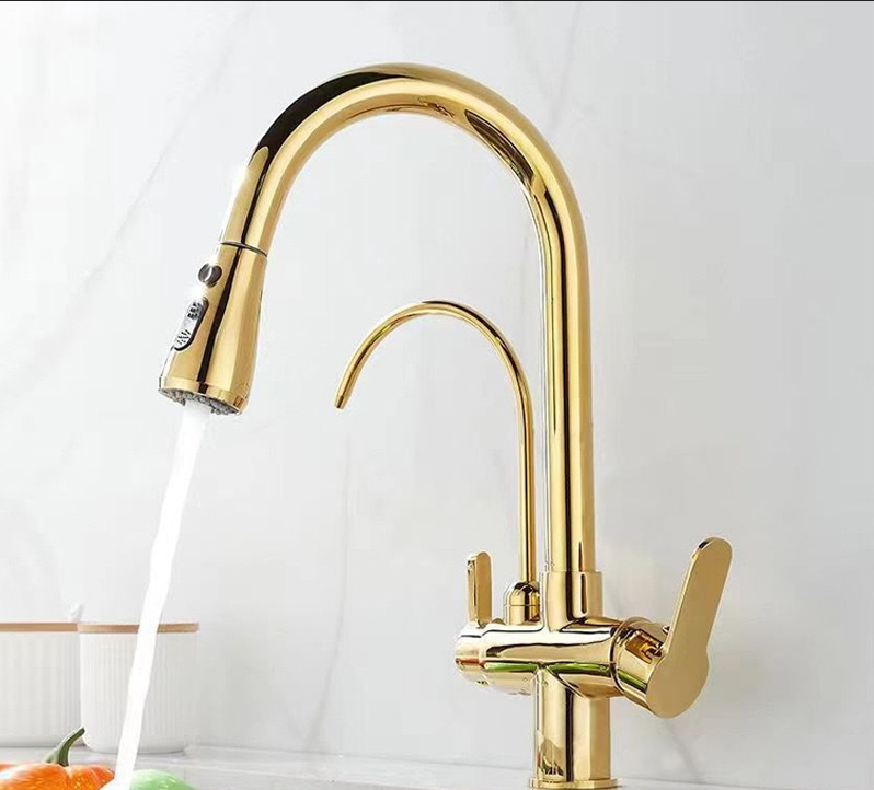 Polished gold kitchen faucet with tall curved spout and pull-out sprayer, side control