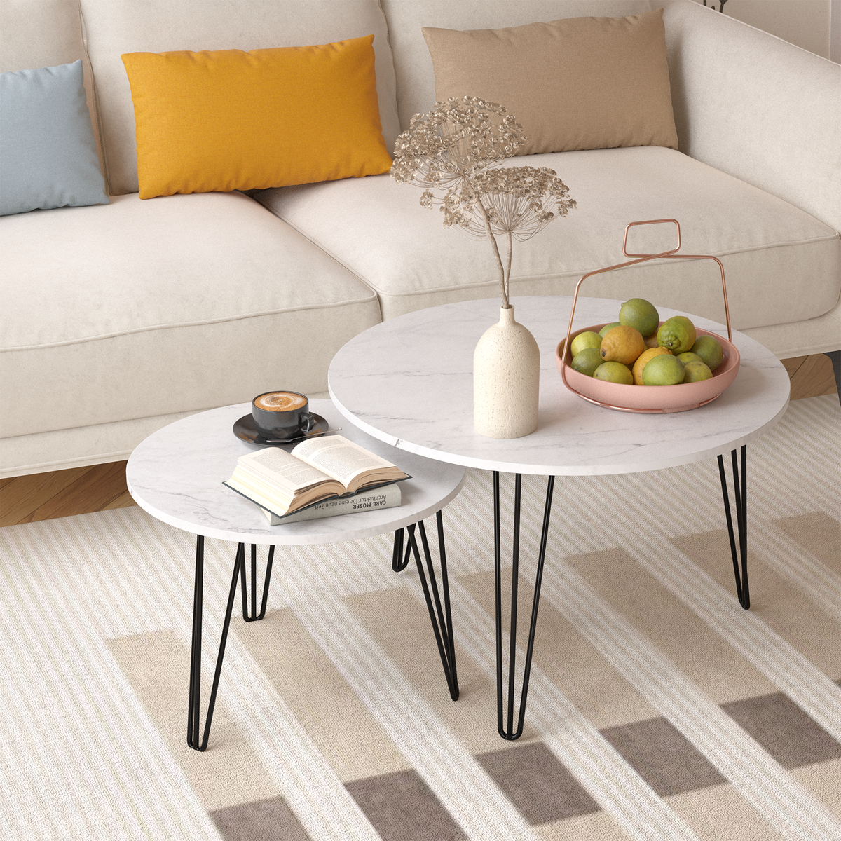 Round nesting coffee table set of 2 with white marble-look tops and black metal legs