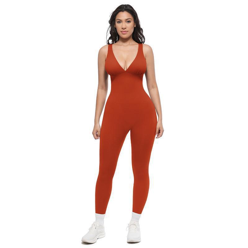 Red women's sleeveless V-neck jumpsuit with long fitted legs, full-body front view