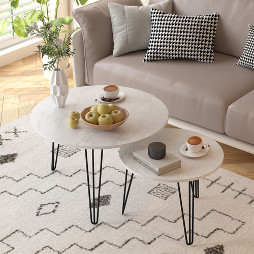 Round nesting coffee table set of 2 with white tops and black tapered metal legs