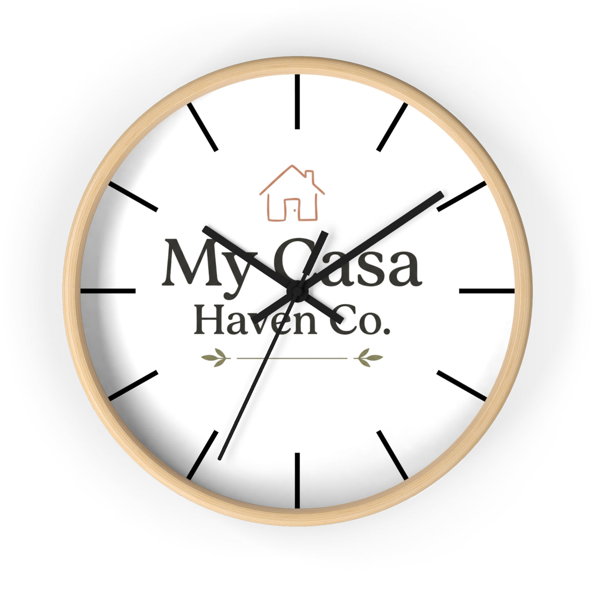 Round wooden wall clock with white dial and black hands, black hour marks.
