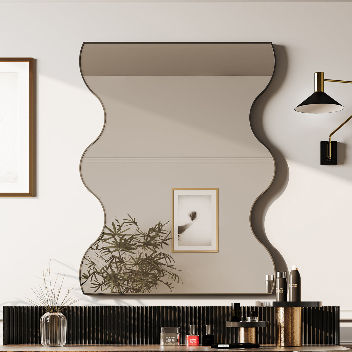 Wall mirror with wavy rectangular outline and black metal frame, mounted above console