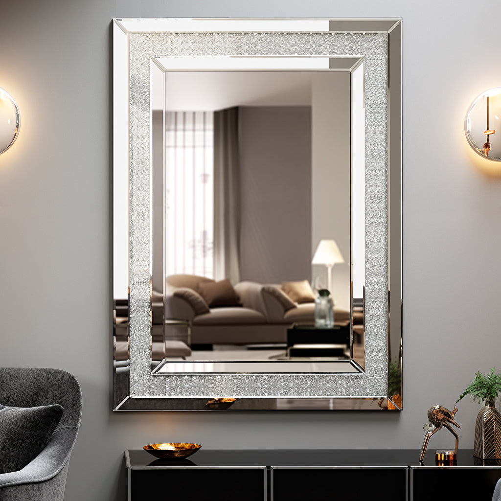 Silver rectangular wall mirror with sparkly textured frame and reflective glass