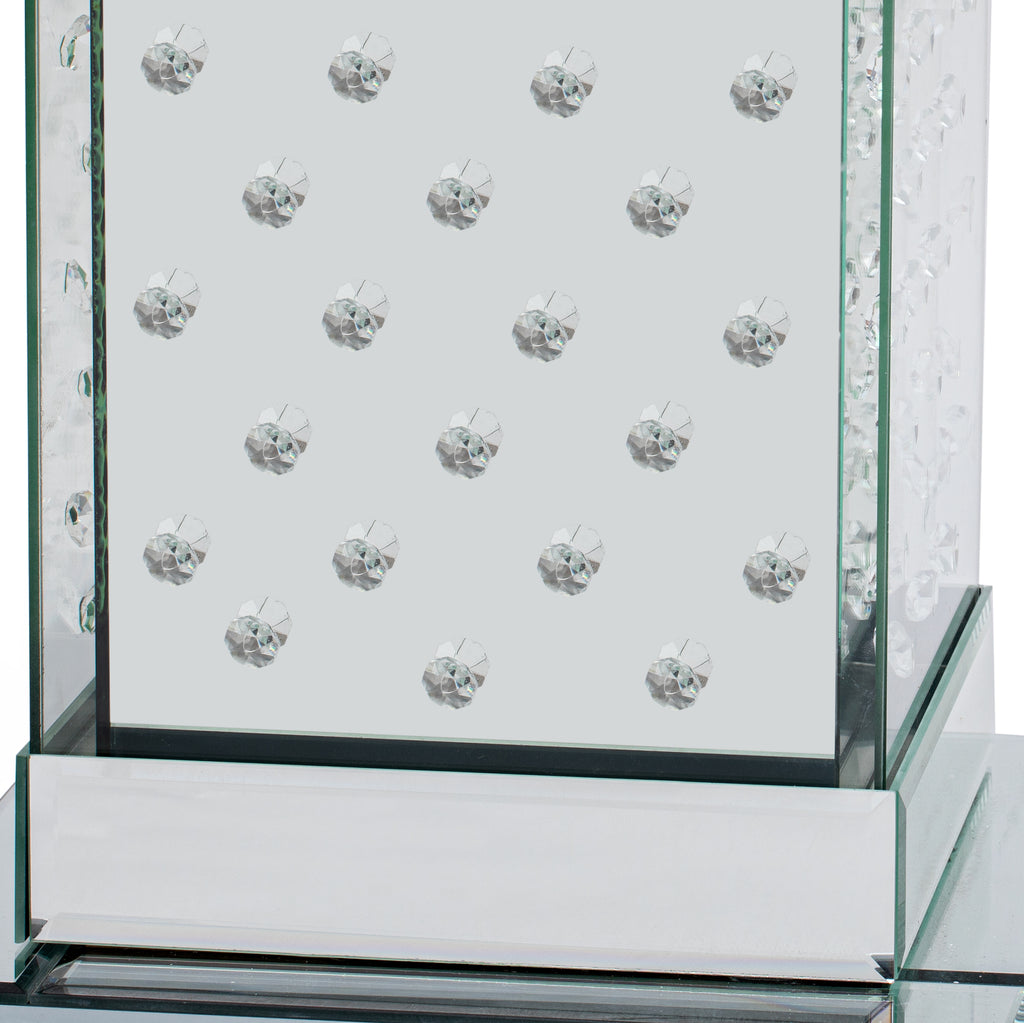 Mirrored tabletop with crystal button inlays and clear glass border in a silver frame.