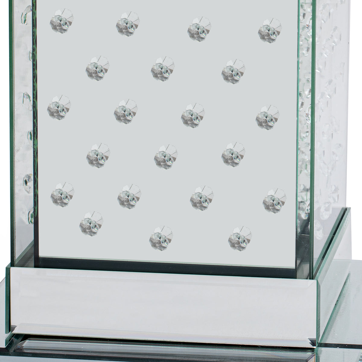 Mirrored tabletop with crystal button inlays and clear glass border in a silver frame.