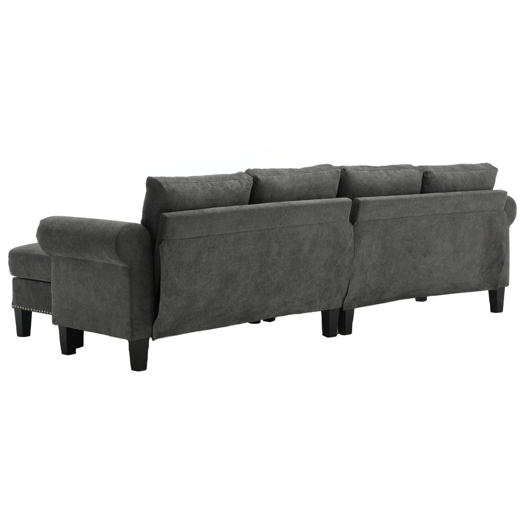 Gray sectional sofa with raised back cushions, chaise extension, and dark legs