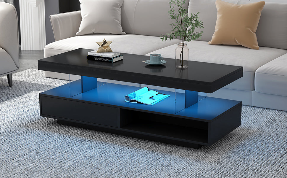 Black LED coffee table with blue LED-lit storage shelf, two drawers, and top decor