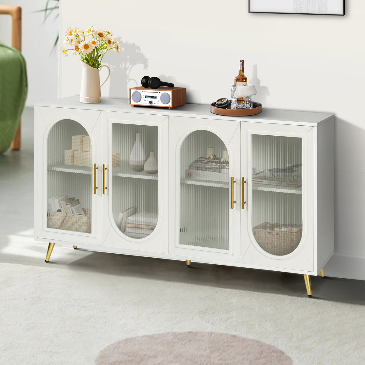 Antique white media cabinet with glass door fronts, arched panels, and gold handles