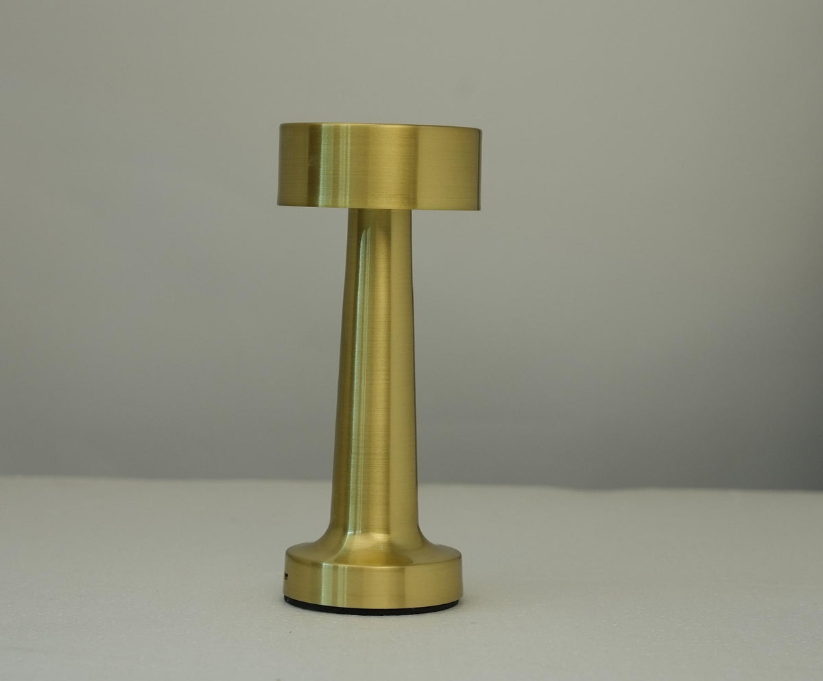 Gold retro table lamp with drum fabric shade and cylindrical metal base