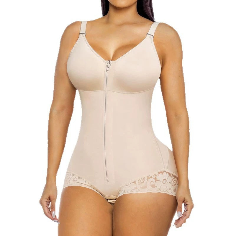 Nude mesh zip-front one-piece shapewear with lace trim and thong-cut legs