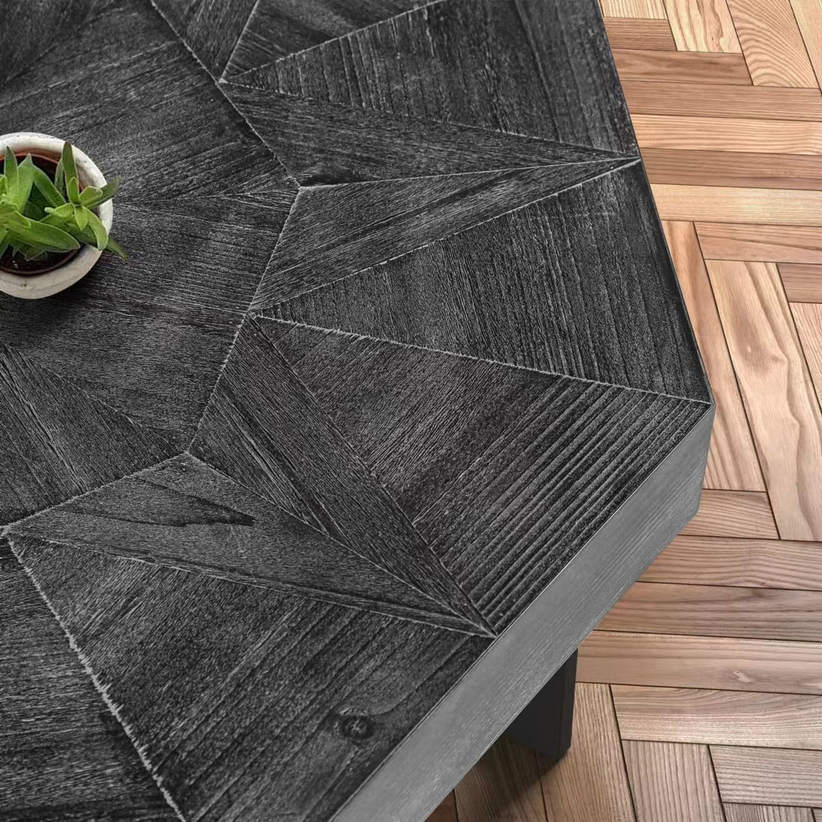 Antique black octagonal tabletop with geometric patchwork texture and beveled edge