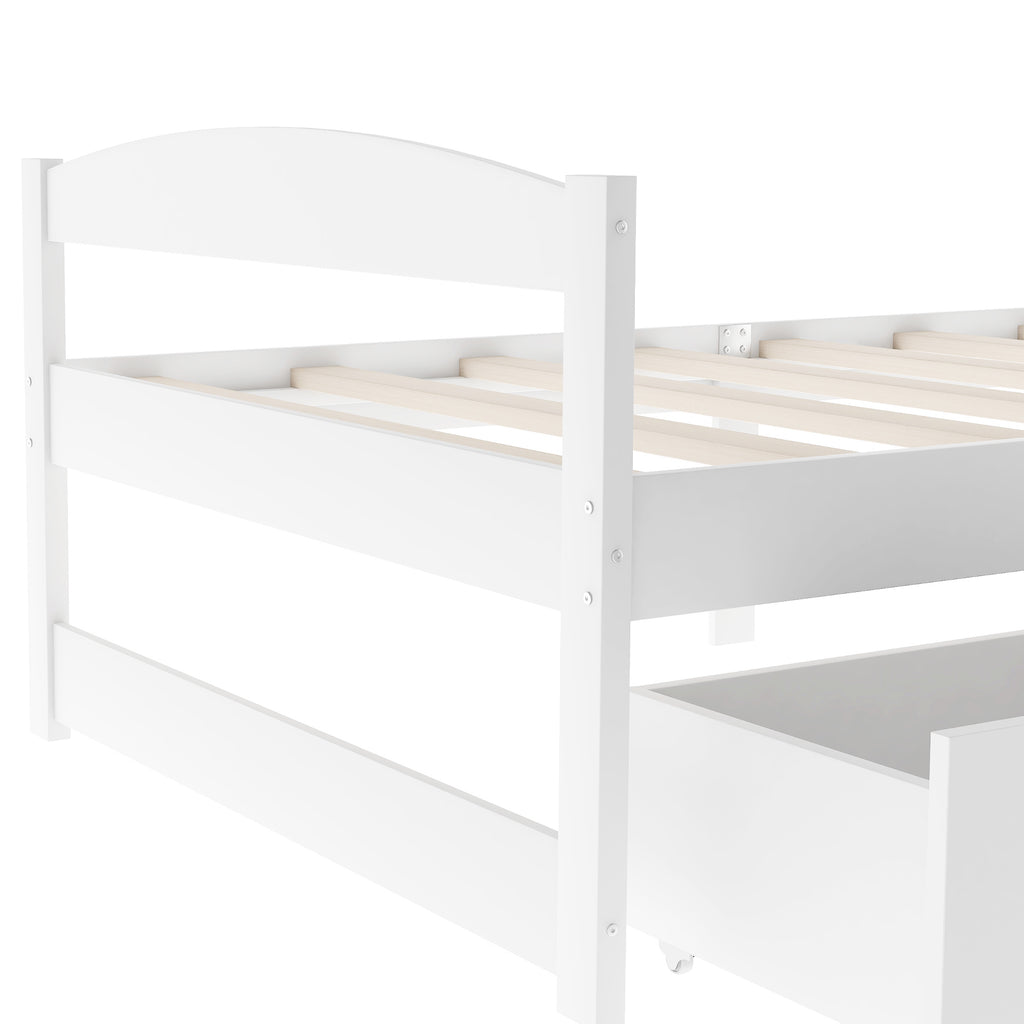 White twin platform bed showing headboard posts and slat support over drawers