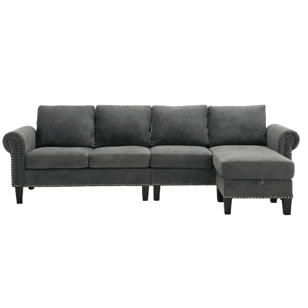 Gray L-shaped sectional sofa with tufted arms, deep back cushions, and chaise ottoman
