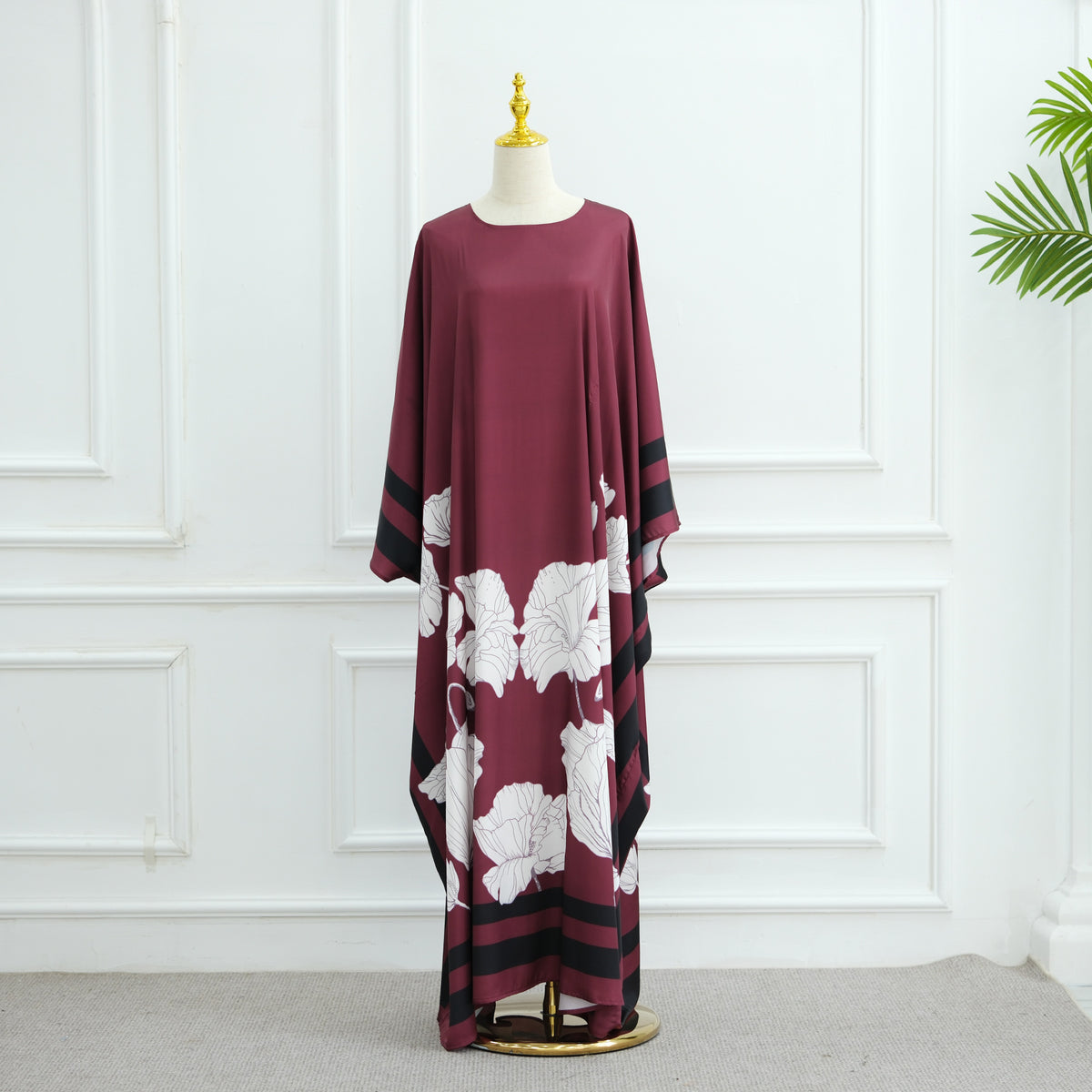 Wine red printed dress with large white floral print and dark striped border