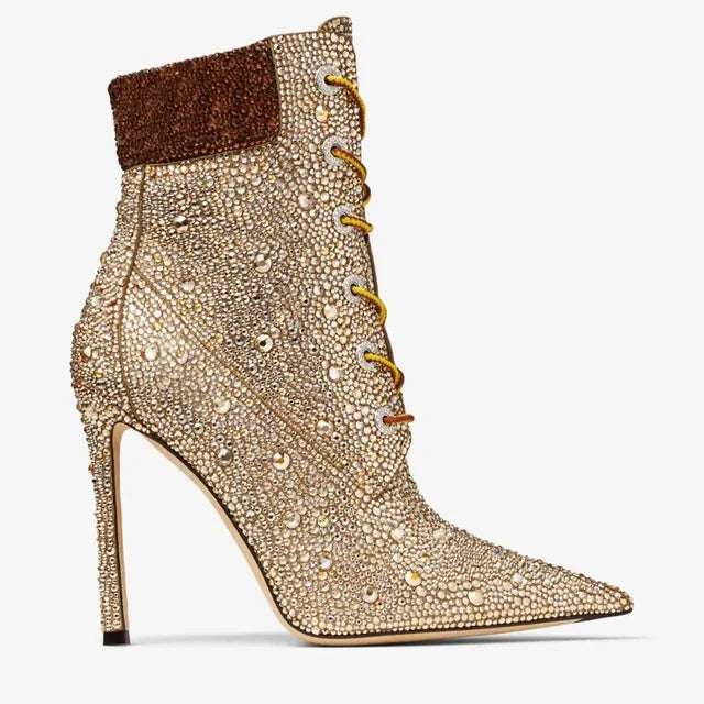 Champagne rhinestone ankle boots with dark brown cuff and yellow-laced eyelets, stiletto heel
