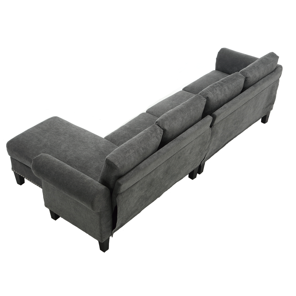 Gray chaise sectional sofa with attached back cushions and dark legs