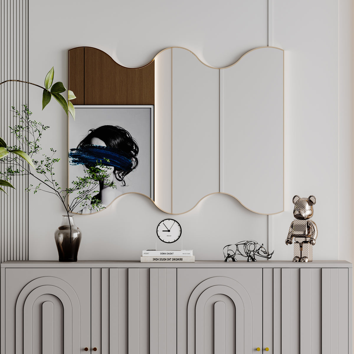Wavy-edged wall mirror with gold metal frame and clear glass