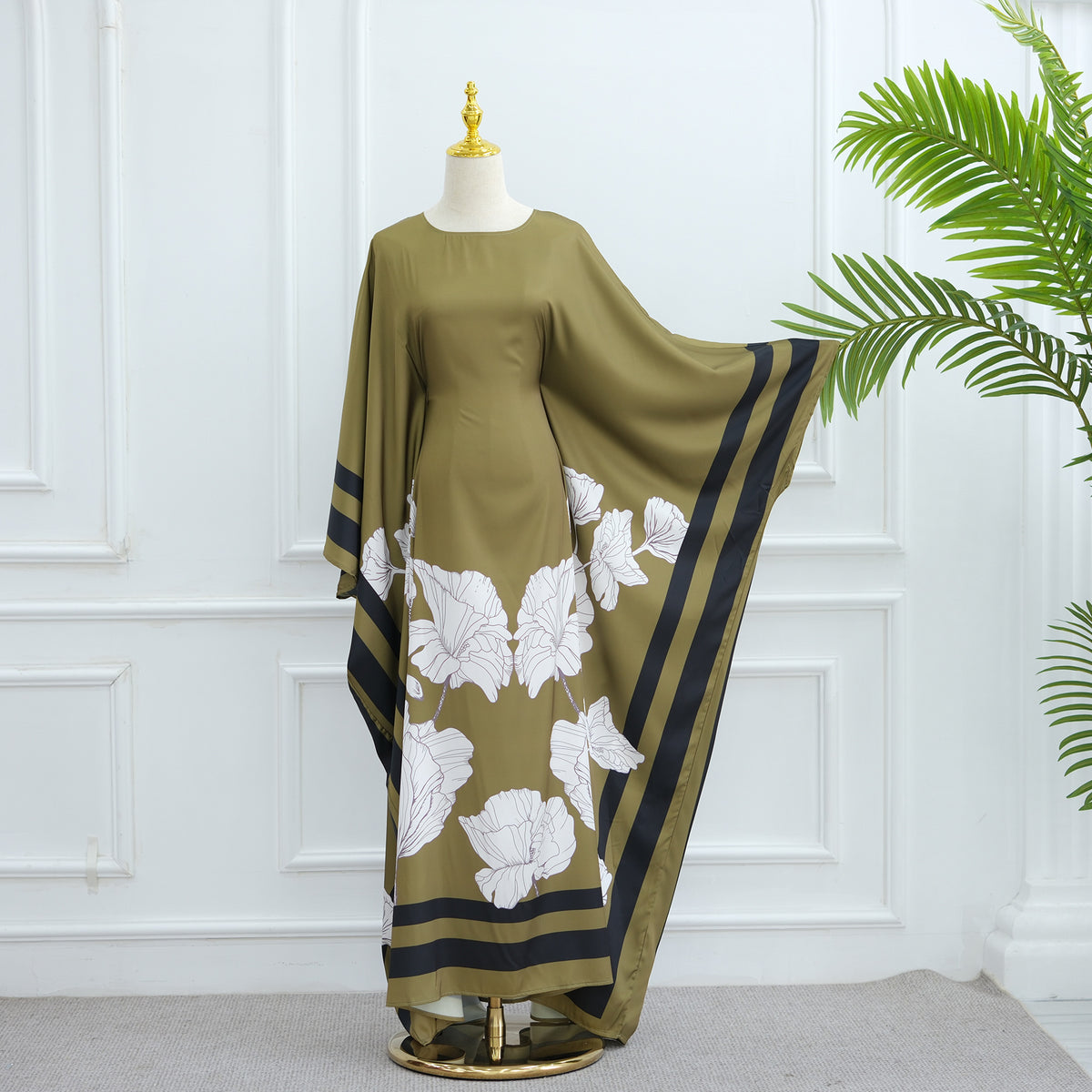 Olive green printed dress with white floral print and dark navy striped accents