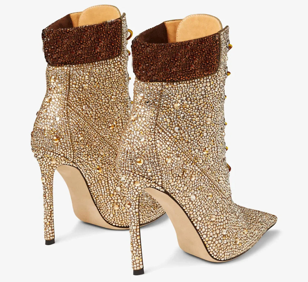 Champagne rhinestone ankle boots with dark brown cuff, pointed toe, stiletto heel; angled
