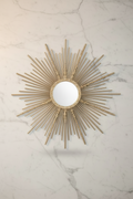 Champagne gold wall mirror with statement frame